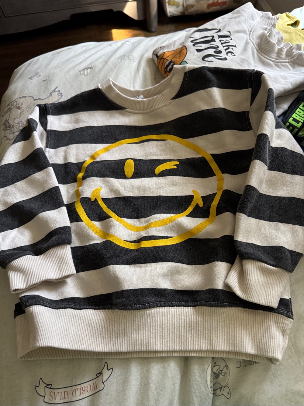 Zara Black & White Striped Sweatshirt with Yellow Wink Smile